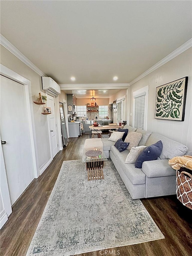 living room with dark hardwood / wood-style flooring, ornamental molding, and a wall mounted AC