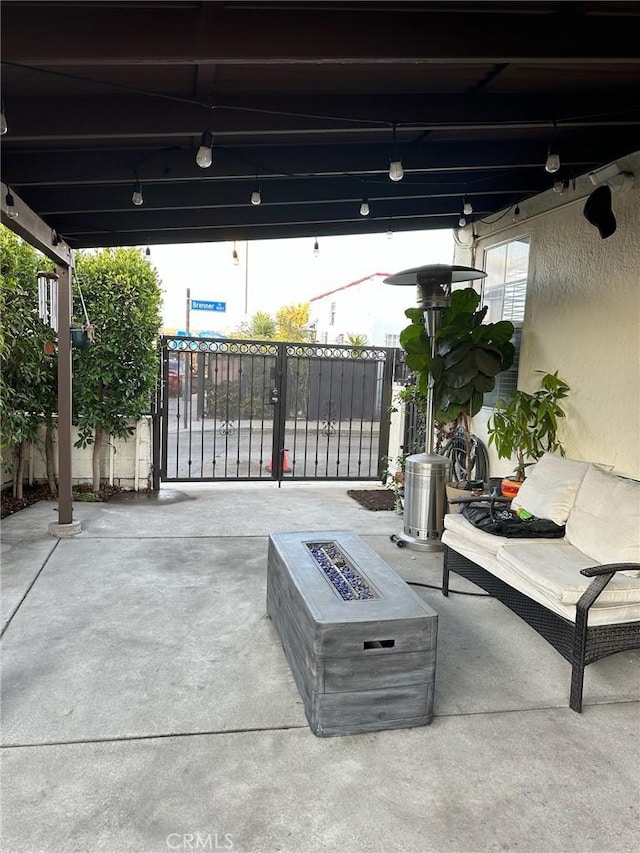 view of patio / terrace featuring a fire pit