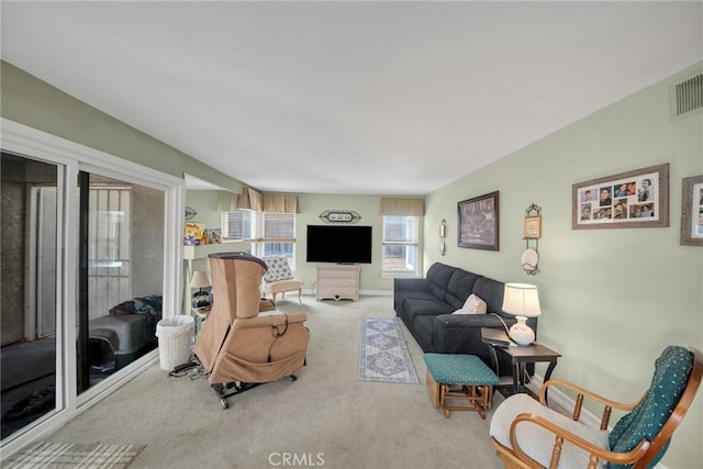 living room with light colored carpet