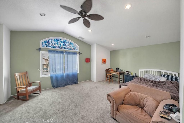 carpeted bedroom with lofted ceiling and ceiling fan