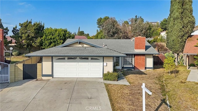 ranch-style home featuring a garage