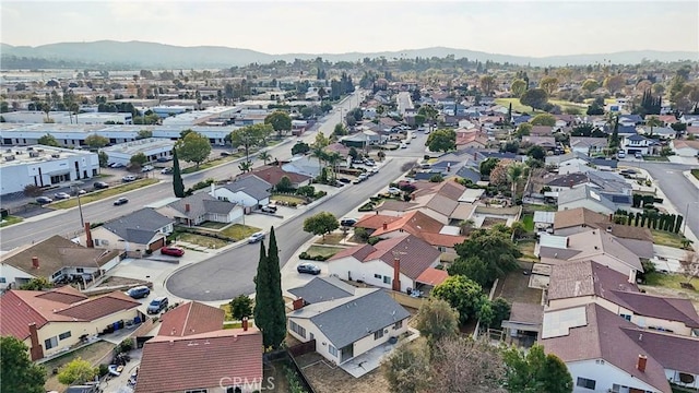 drone / aerial view featuring a mountain view