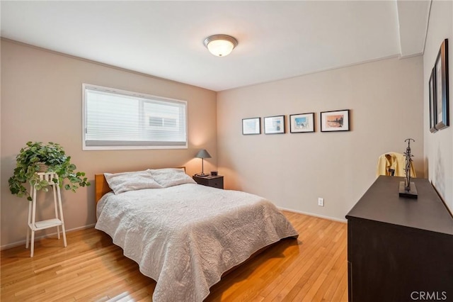 bedroom featuring hardwood / wood-style flooring