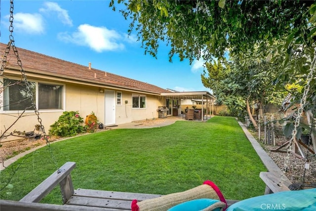 view of yard with a patio area