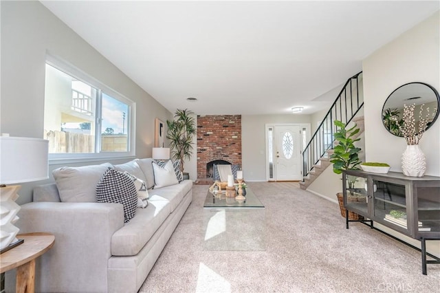 carpeted living room with a fireplace