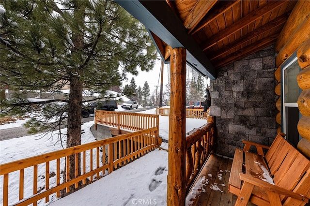 view of snow covered deck