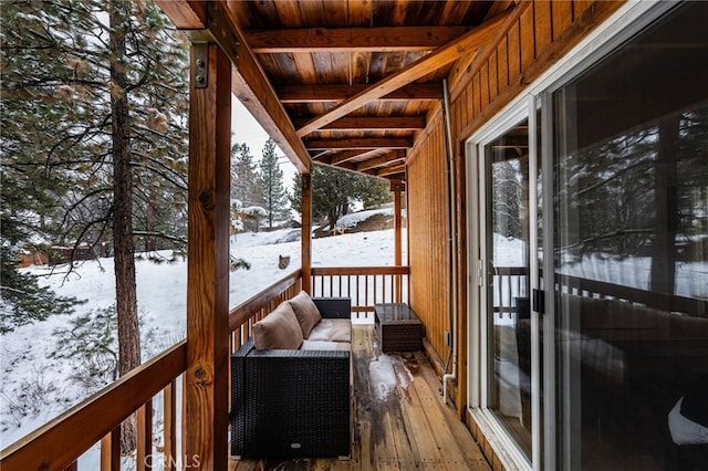 view of snow covered deck