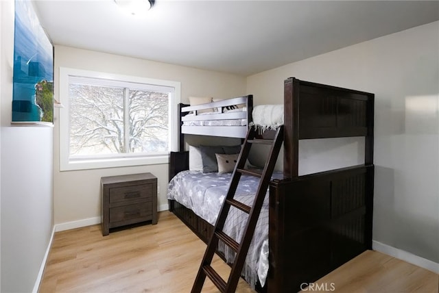 bedroom with light hardwood / wood-style floors