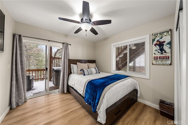 bedroom featuring access to outside, ceiling fan, and light hardwood / wood-style flooring