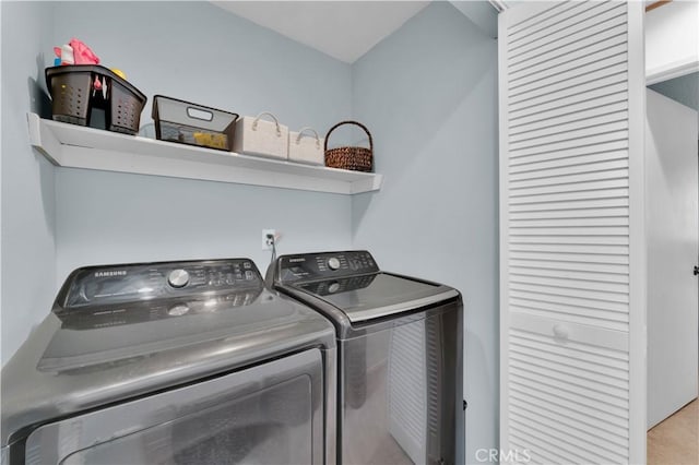 laundry room featuring washer and clothes dryer