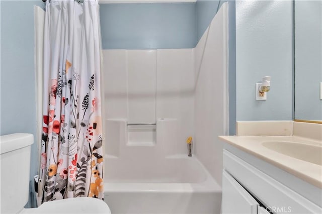 full bath featuring shower / tub combo, vanity, and toilet