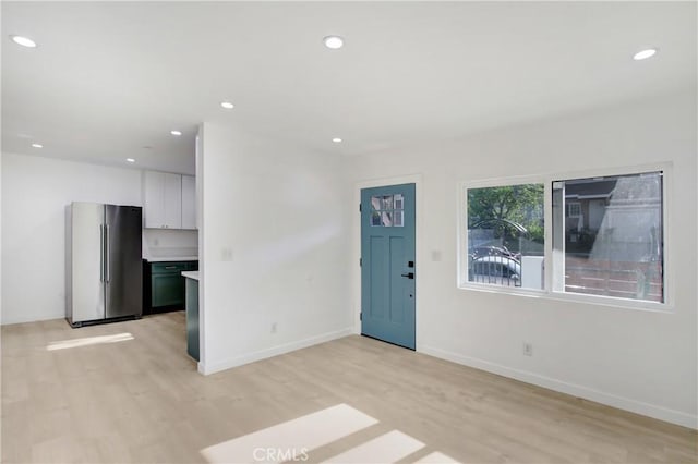 interior space with light hardwood / wood-style flooring