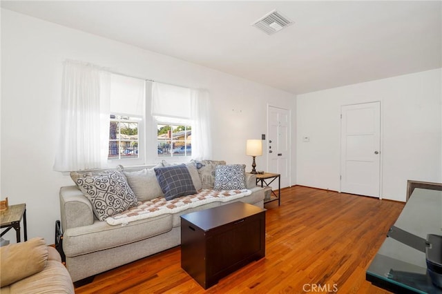 living room with hardwood / wood-style floors