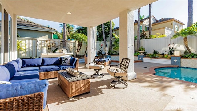 view of patio / terrace featuring a fenced in pool and outdoor lounge area