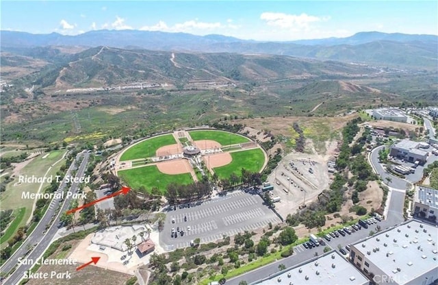 drone / aerial view featuring a mountain view