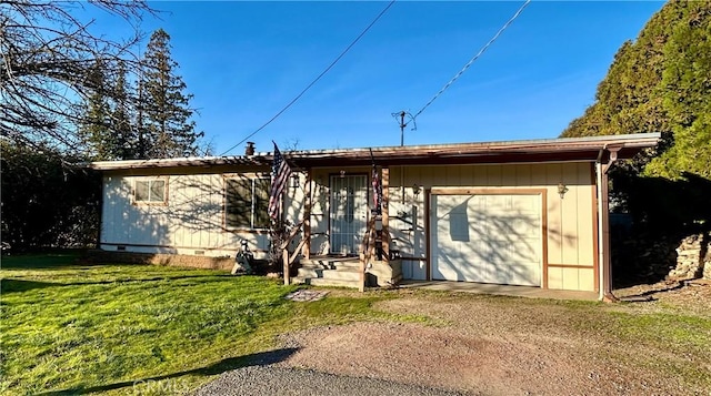 rear view of house with a yard