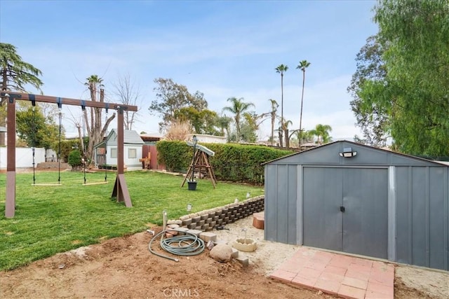 view of outdoor structure with a playground and a lawn