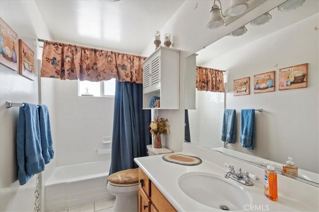 full bathroom featuring vanity, shower / tub combo with curtain, tile patterned floors, and toilet