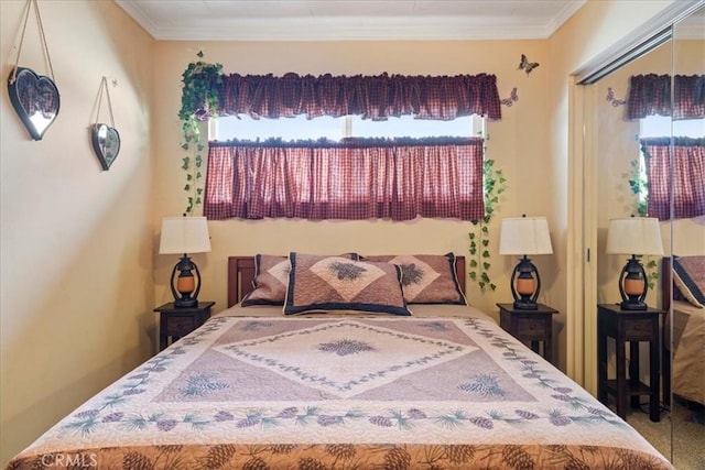 bedroom featuring crown molding