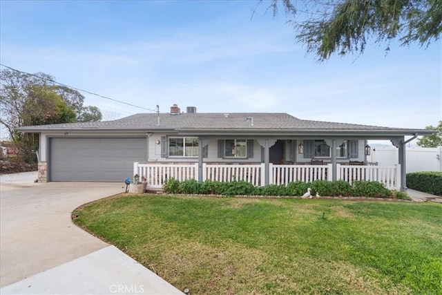 ranch-style home with a porch, a garage, and a front lawn