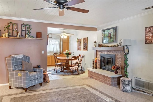 living room with ornamental molding and carpet