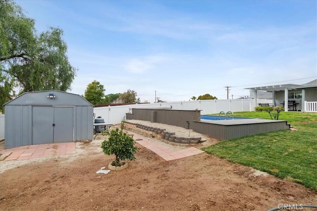 view of yard featuring a storage unit and a pergola