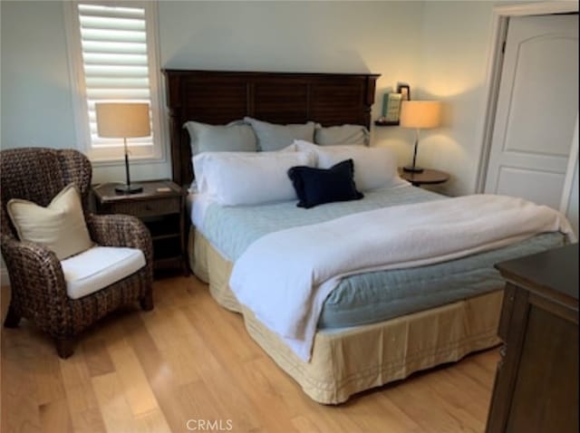 bedroom featuring light wood-type flooring