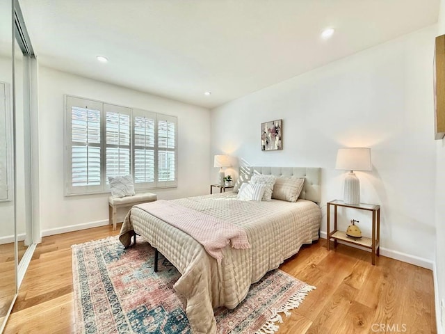 bedroom featuring light wood-type flooring