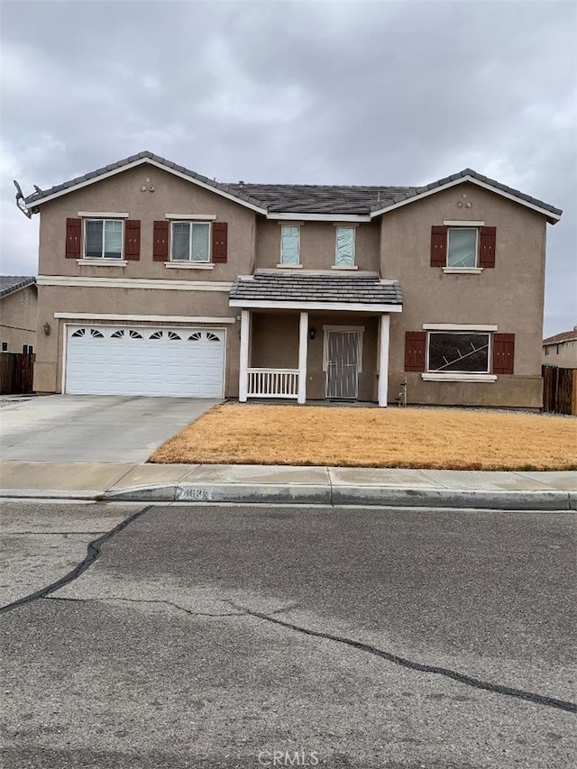 front of property with a garage