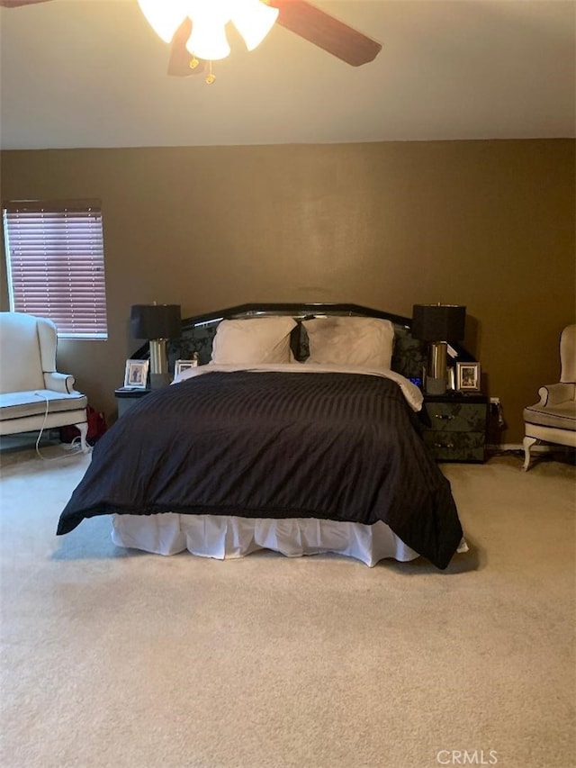 bedroom featuring carpet and ceiling fan