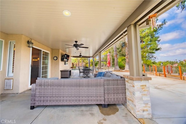 view of patio / terrace featuring an outdoor living space and ceiling fan