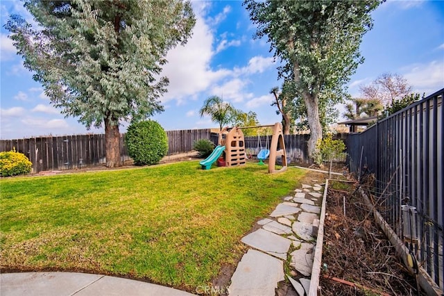 view of yard featuring a playground