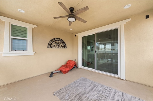 view of patio with ceiling fan