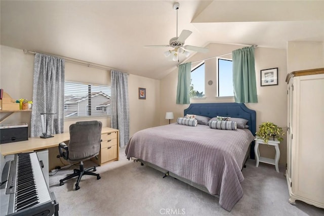 carpeted bedroom featuring vaulted ceiling and ceiling fan