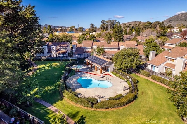 birds eye view of property featuring a mountain view