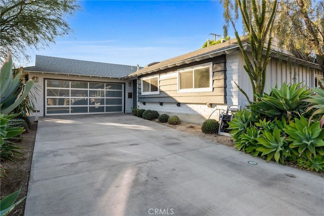 ranch-style home with a garage