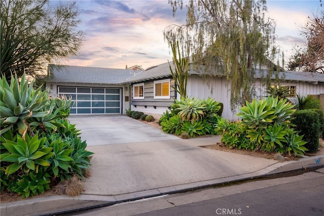 view of front of home featuring a garage