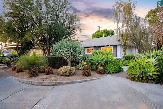 view of property exterior at dusk