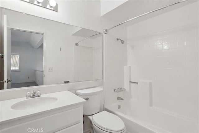 full bathroom featuring vanity, bathing tub / shower combination, and toilet