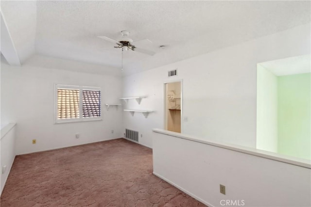 unfurnished living room featuring ceiling fan and light carpet