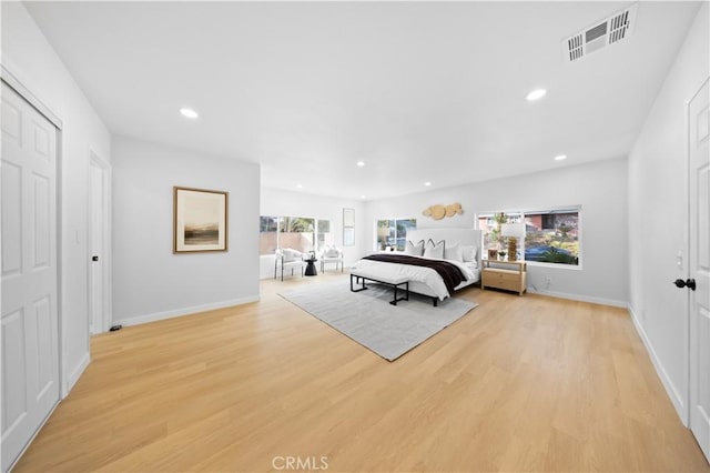 bedroom featuring light hardwood / wood-style flooring