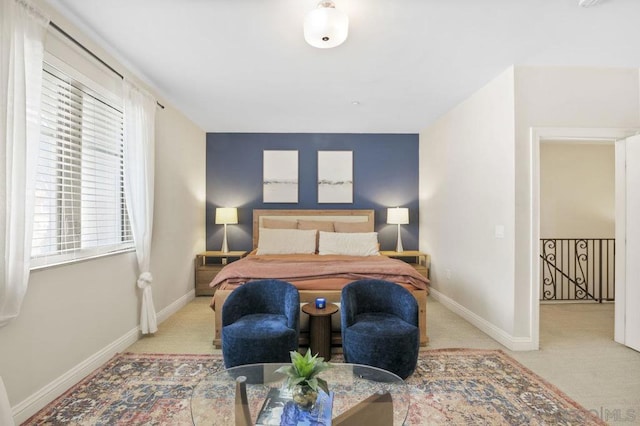 bedroom with light colored carpet