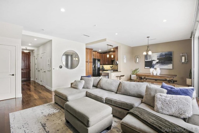 living room with dark hardwood / wood-style floors