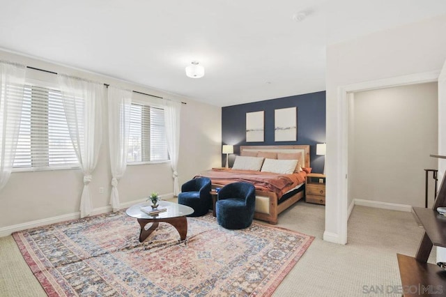 bedroom with light colored carpet