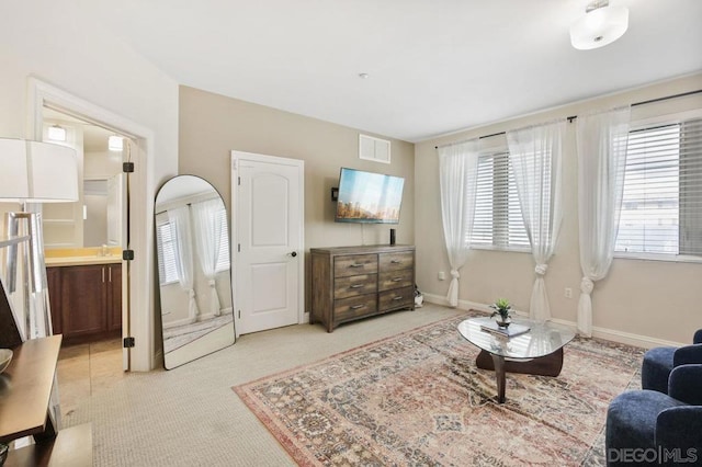 living room with light colored carpet