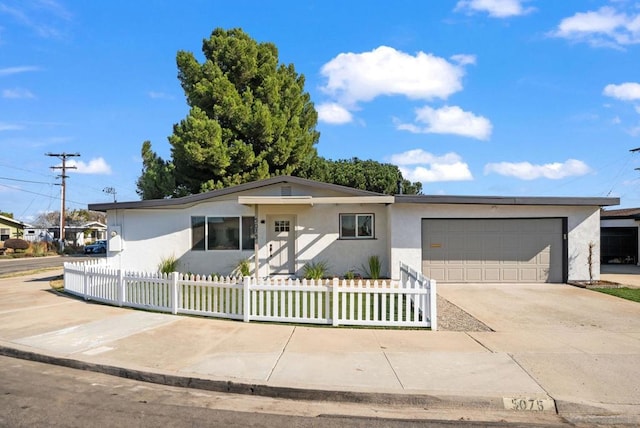 single story home with a garage