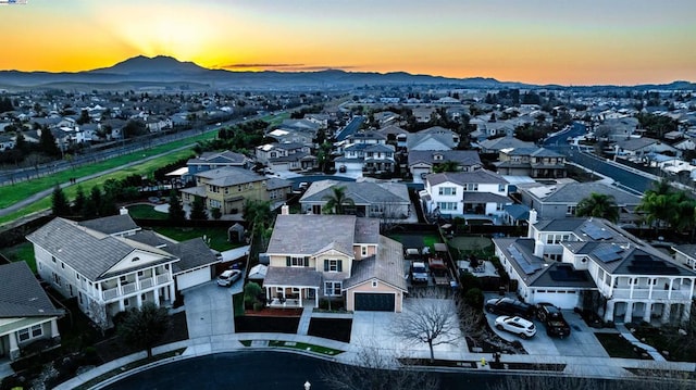 aerial view at dusk with a mountain view