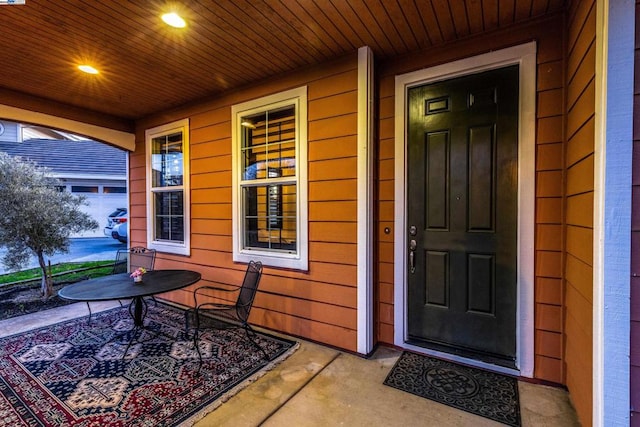 property entrance with a porch