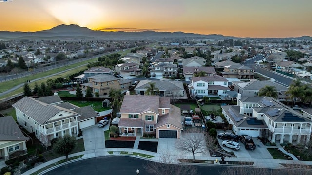 aerial view at dusk with a mountain view