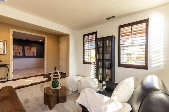 sitting room with carpet flooring